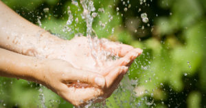 washing hands under running water